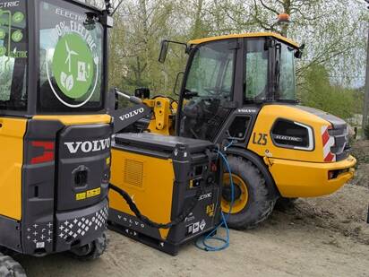 Charging compact electric construction machines on work site.